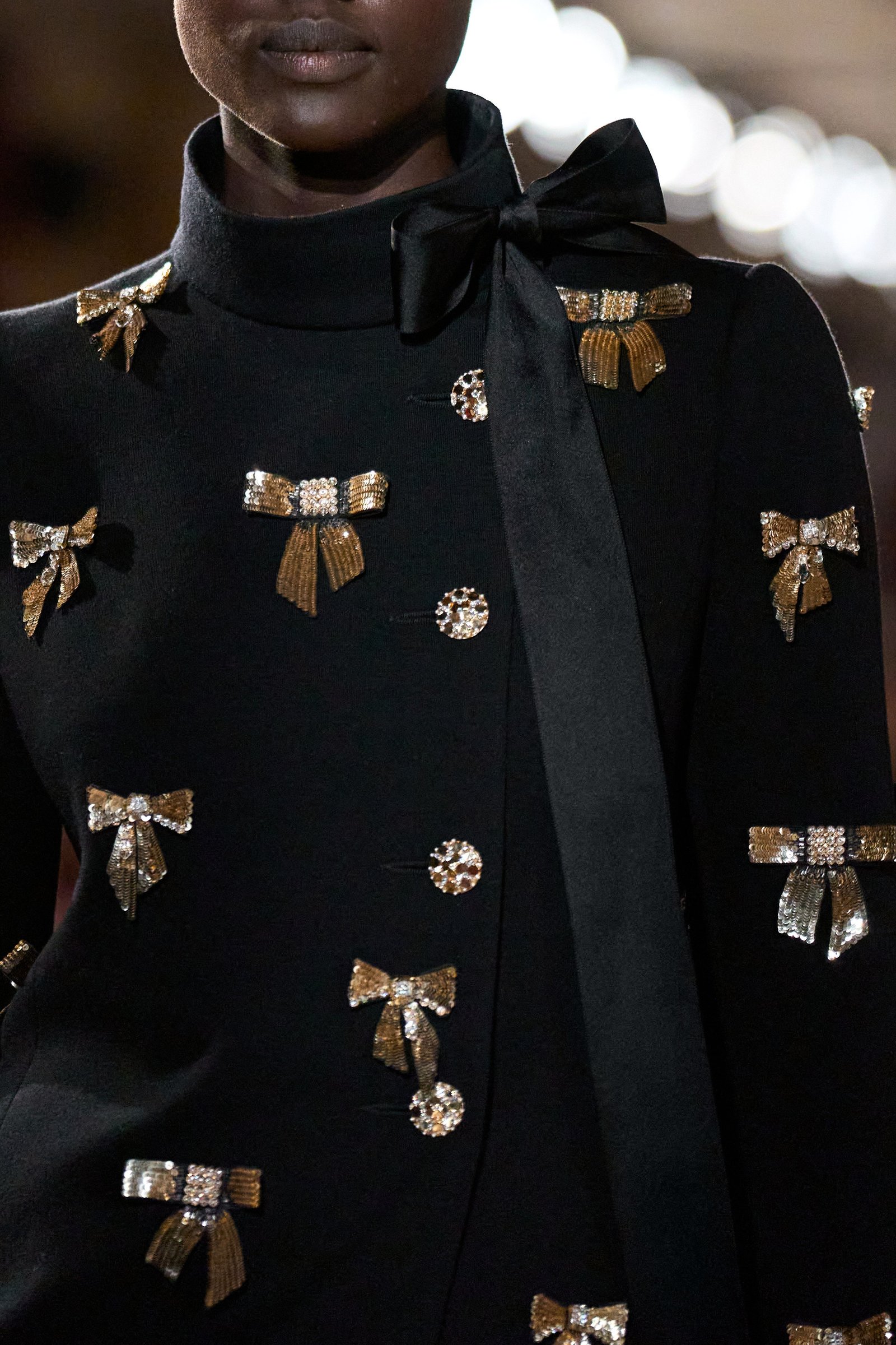 Image may contain Accessories Formal Wear Tie Adult and Person