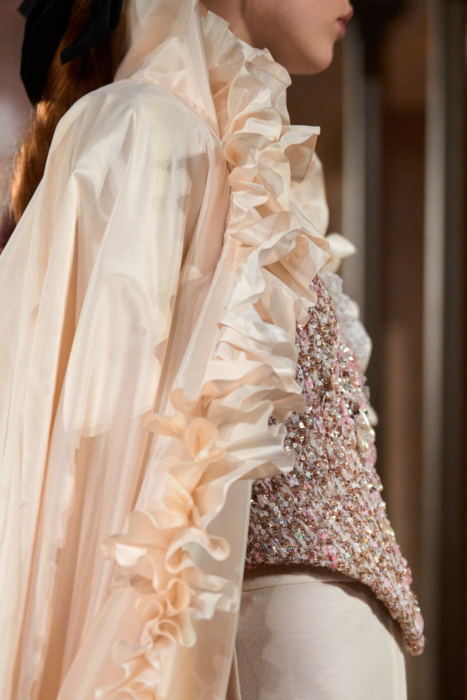 Image may contain Blouse Clothing Dress Adult Person Wedding Sleeve Long Sleeve Fashion Formal Wear and Gown